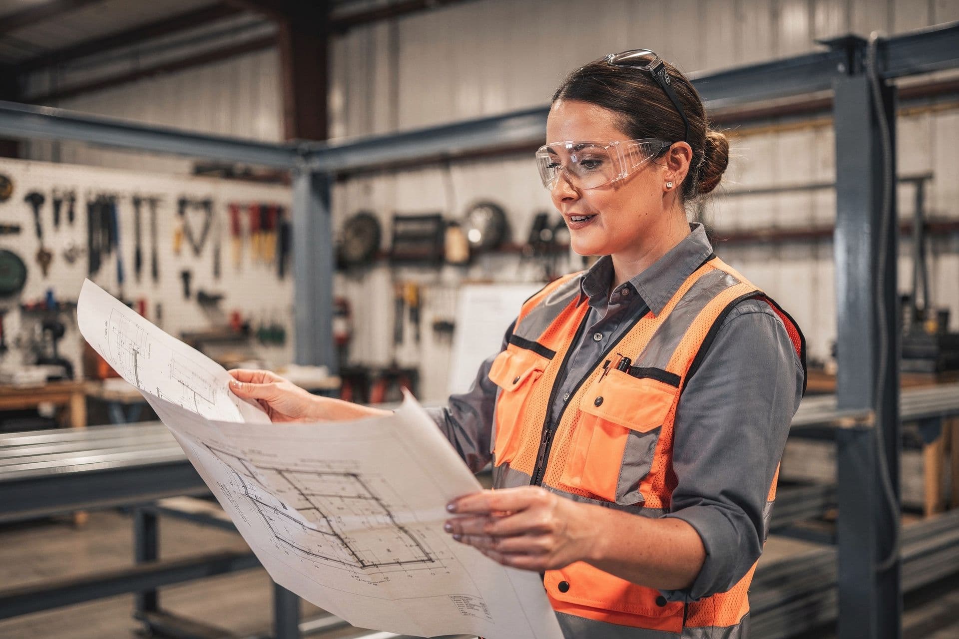 Megan Crawford, Chief Operating Officer & Co-Founder of Premier Construction Solutions LLC a construction business in North Texas standing confidently