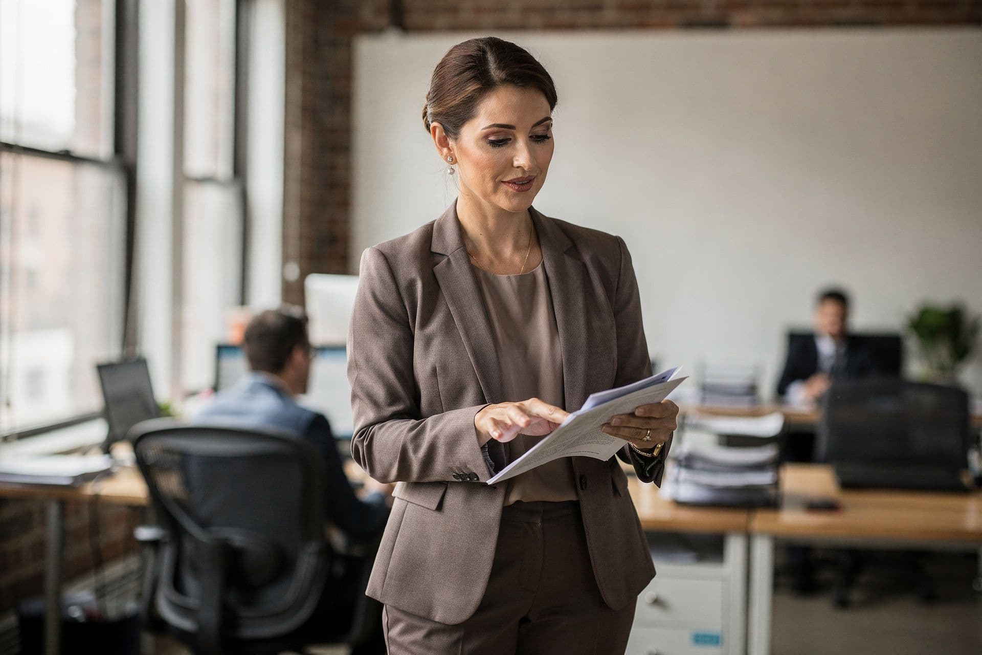 Natasha Newman, Chief Operating Officer of Upper Manhattan Staffing Solutions a business-services business in New York standing with a calm, assured presence