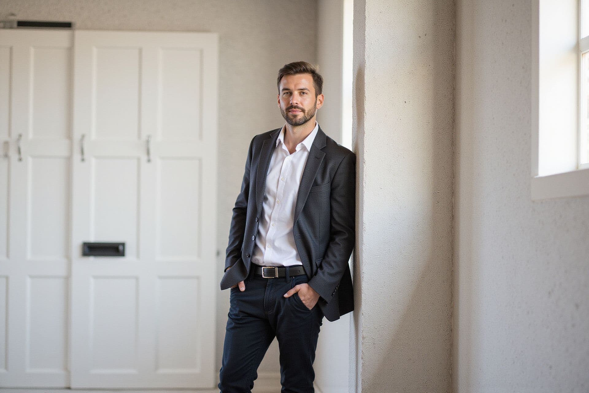 Oliver Tarantino, President & Chief Development Officer of SunsetBuild Inc a real-estate business in Southern California standing with subtle confidence